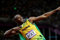 LARI 100 METER OLIMPIADE: Raih Emas, Bolt Cetak Rekor