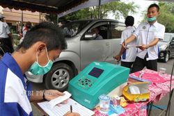 SOLOPOS HARI INI : Soloraya Hari Ini : 200.000 Pekerja Belum Bersertifikasi hingga Tilang Mobil Tak Layak Emisi