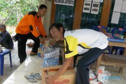  PUTING BELIUNG: Warga Jatiroto Bangun Posko Bencana Darurat