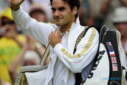 Federer Mengemasi Koper di Rotterdam