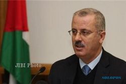 RAMI HAMDALLAH Tetap PM Palestina