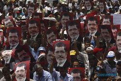 KUDETA MESIR : Morsi Tak Ditahan Bareng Para Ajudannya