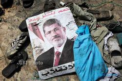 KRISIS MESIR : Mursi Dituding Terlibat dalam Kematian Para Demonstrans di 2012