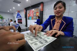 RUPIAH MELEMAH : Transaksi Valas di Perbankan di Kota Solo Turun