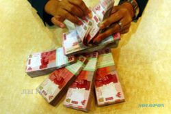 KURS RUPIAH : Nyaris Tembus Rp14.150/dolar AS, Rupiah Tertekan Ekonomi Global