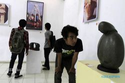 PAMERAN PATUNG