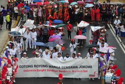 FOTO DUKUNGAN UNTUK JOKOWI : Seknas Jokowi Gelar Pawai Dukung Jokowi Jadi Capres 2014