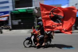 NATAL 2014 : Tak Ada Bendera PDIP yang Menyambut Jokowi di Papua