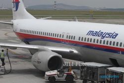 PESAWAT MALAYSIA AIRLINES HILANG: AU Malaysia Bantah Temukan Jejak di Selat Malaka