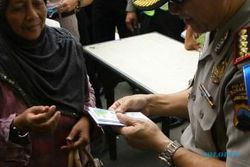 RAMADAN 2014 : Polresta Solo Bagikan Zakat Fitrah Berwujud Uang