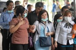 PESAWAT AIRASIA DITEMUKAN : 2 Jenazah Teridentifikasi, Tim DVI Harus Gunakan Uji DNA