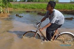 BANJIR MADIUN : Air Limpahan Bengawan Madiun Surut, Warga Masih Waswas