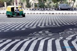 GELOMBANG PANAS INDIA : Aspal Jalanan Pun Meleleh Disengat Panas 50 Derajat Celcius