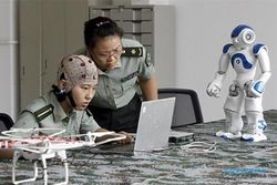 TEKNOLOGI ROBOT : Tiongkok Rancang Alat Pengendali Robot Canggih