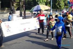CAR FREE DAY MADIUN : Suara Muslim FM Ajak Sumbang Seribu Masker
