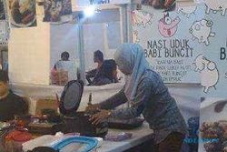 FOTO KONTROVERSIAL : Heboh! Penjual Nasi Uduk Babi Buncit Pakai Jilbab