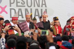 Hina Jokowi Pakai Topi Khas Batak, Facebooker Dipolisikan