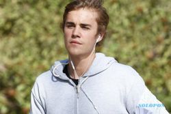 Justin Bieber Tepergok Libur Bareng Wanita Misterius