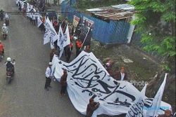 PEMBUBARAN ORMAS : Polisi Larang Massa HTI Demo