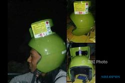 FOTO VIRAL: Kocak, Pria Ini Pakai Helm Modifikasi Tabung Gas Melon