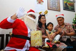Asal-usul Santa Claus dalam Perayaan Natal dengan Berbagi Hadiah