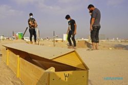 Ratusan Warga Bongkar Makam Korban Corona di Irak, Kenapa?