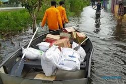 100.000 Warga Banjarmasin Mengungsi Kebanjiran