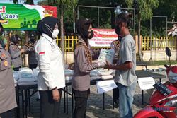 Polres Sragen Salurkan 1.124 Paket Zakat Fitrah untuk Warga