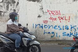 Coretan Indonesia Lagi Sakit Muncul di Tembok Pertokoan Jl Kusumoyudan Solo