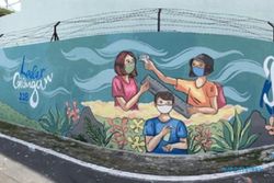 Mural Protokol Kesehatan Karya KKN UNS Tim 118 Hiasi Dinding di Gilingan