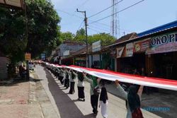 Kirab Hari Santri, Bendera Merah Putih Sepanjang 1 Kilometer Diarak di Boyolali
