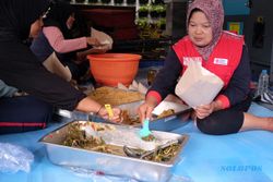 Ribuan Porsi Makanan Disiapkan di Dapur Umum untuk Warga Terdampak Banjir Solo