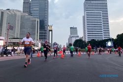 Ribuan Pelari Berkompetisi di LPS Monas Half Marathon Jakarta