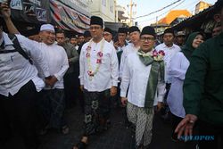 Potret Kebersamaan Anies-Cak Imin Ziarah ke Makam Sunan Ampel di Surabaya