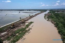 Progres Perbaikan Tanggul Jebol di Sungai Wulan Demak